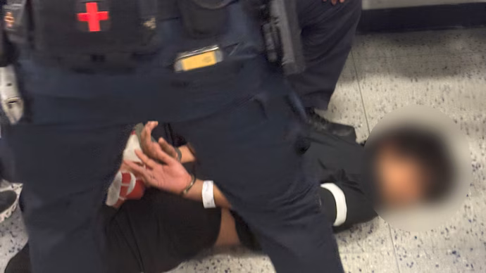 indian-student-handcuffed--deported-092133544-16x9_0